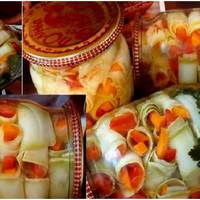 Вишукана святкова закуска – консервовані кабачкові рулетики. На святковому столі вони розлітаються одні з найперших, а всі гості відразу питають рецепт. Неймовірно смачно і дуже красива подача