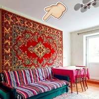 Для чого колись усі вішали килими на стіни, та чому зараз знову так роблять